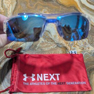 Under Armour Nitro Youth Sunglasses in crystal clear with blue lenses.